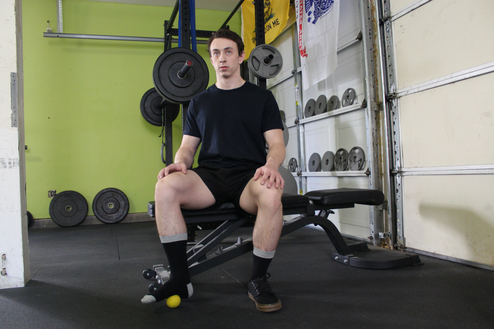 Lacrosse Ball Massage Feet Sitting Down