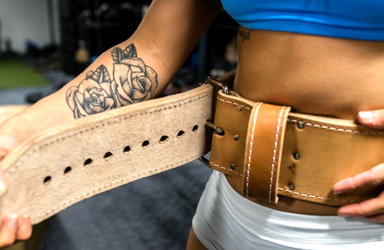 Powerlifting Belt Worn By A Female Powerlifter Before Completing Deadlifts