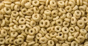 A bowl of honey nut cheerio cereal that's high in fiber, promotes heart health, and in moderation, is good for weight loss.