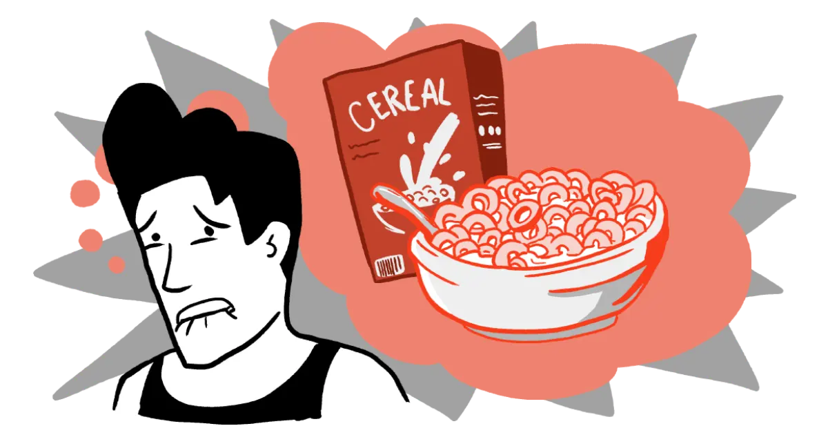 A man is looking at a bowl of honey nut cheerio cereal while fighting the cravings to eat the entire box.