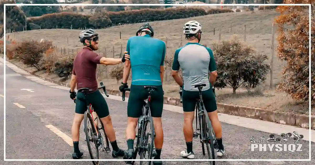 Three men on a backcountry road are chatting about their journey, cycling an hour each day for weight loss.