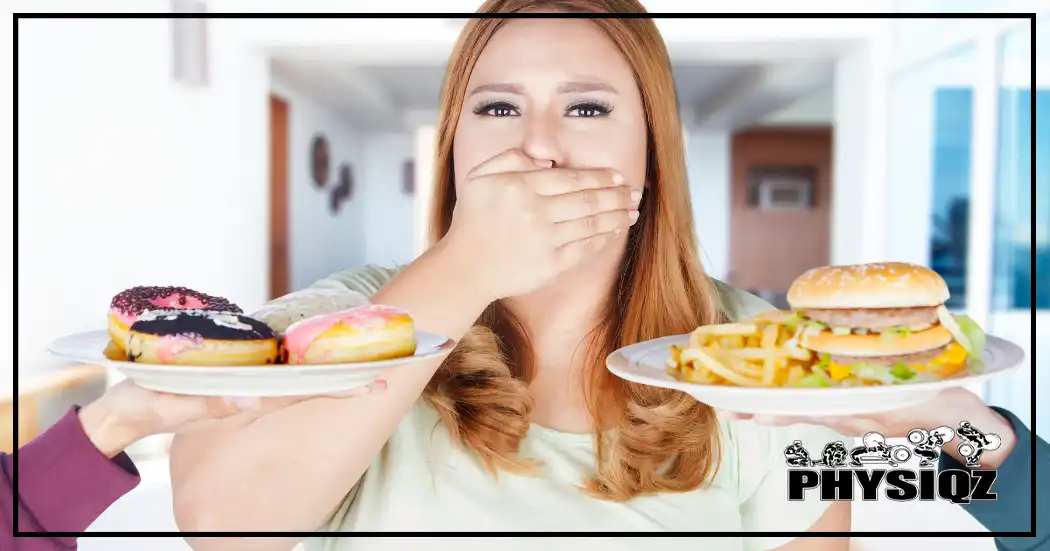 A woman with red hair is looking at a plate of strawberry glazed donuts and another plate containing a hamburger and french fries while she's asking herself how many calories on a cheat day are acceptable to see progress.