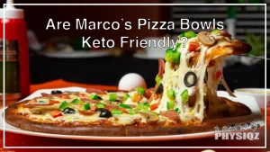 A person is taking a slice from a whole pizza with garnished with different toppings such as olives, mushrooms, and green pepper, served on a white plate as he wonders, "are Marco's Pizza bowls keto friendly?".