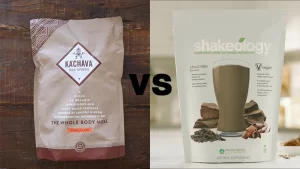 A side-by-side comparison of Ka'chava vs Shakeology protein supplements; on the left is a brown packaging of Ka'chava in chocolate flavor, and on the right is a white packaging of Shakeology which is also in chocolate flavor.