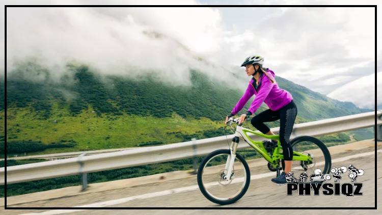 A woman wearing a helmet and a purple jacket is cycling against the backdrop of majestic mountains and clouds, she looks focused and determined, pedaling her bike with a serene expression on her face, the beautiful landscape around her adds to the sense of adventure and the joy of outdoor cycling.