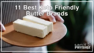 A white woman with a black and white striped apron is holding a wooden plate with two hands and it has two sticks of one of the best keto friendly butter brands (Horizon & Vital Farms) resting on top of it and there's a green aloe vera plant in the background.