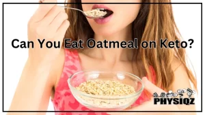 A woman wearing a pink tank top, red lip stick and who has strawberry blonde hair is holding a glass bowl with her left hand and with her right she's holding a silver spoonful of oats near her mouth and questions whether or not they're keto before taking a bite.
