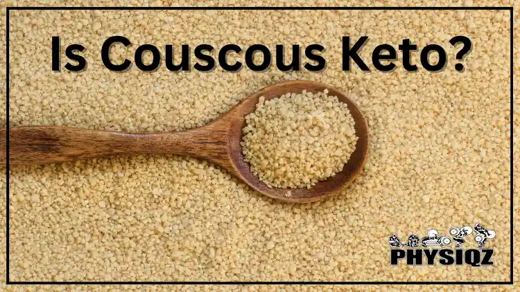 A wooden spoon shows a high carb dish which is couscous, keto unfriendly dieter holding a wooden spoon full of grains on top of a couscous-filled surface.